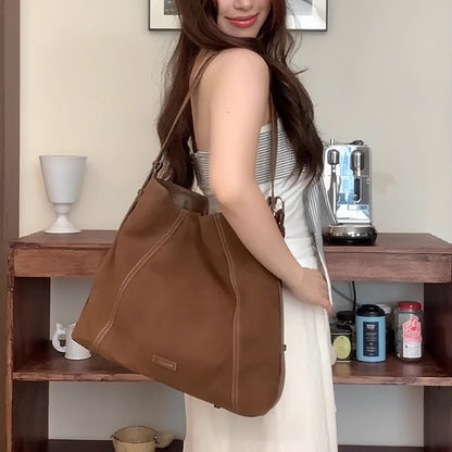 Sac messager en cuir souple et daim de haute qualité, grande capacité et au design épuré